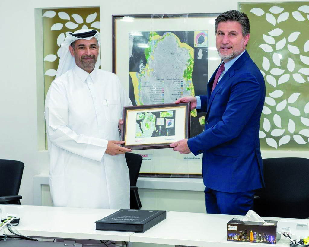 Minister of Environment and Climate Change H E Sheikh Dr. Faleh bin Nasser bin Ahmed bin Ali Al Thani receiving the high-resolution maps of Qatar’s beaches, during his visit to the ExxonMobil Research Qatar (EMRQ) Center at Qatar Science and Technology Park, yesterday.