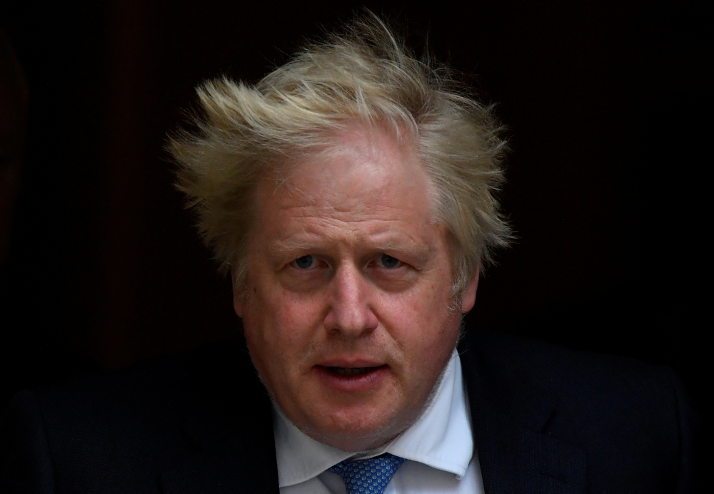 British Prime Minister Boris Johnson departs Downing Street to deliver a statement at the Houses of Parliament, London, Britain, April 19, 2022. REUTERS/Toby Melville
