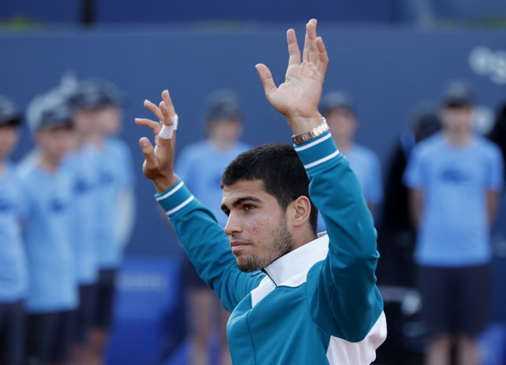 April 24, 2022 Spain's Carlos Alcaraz Garfia celebrates after winning the final match against Spain's Pablo Carreno Busta REUTERS/Albert Gea