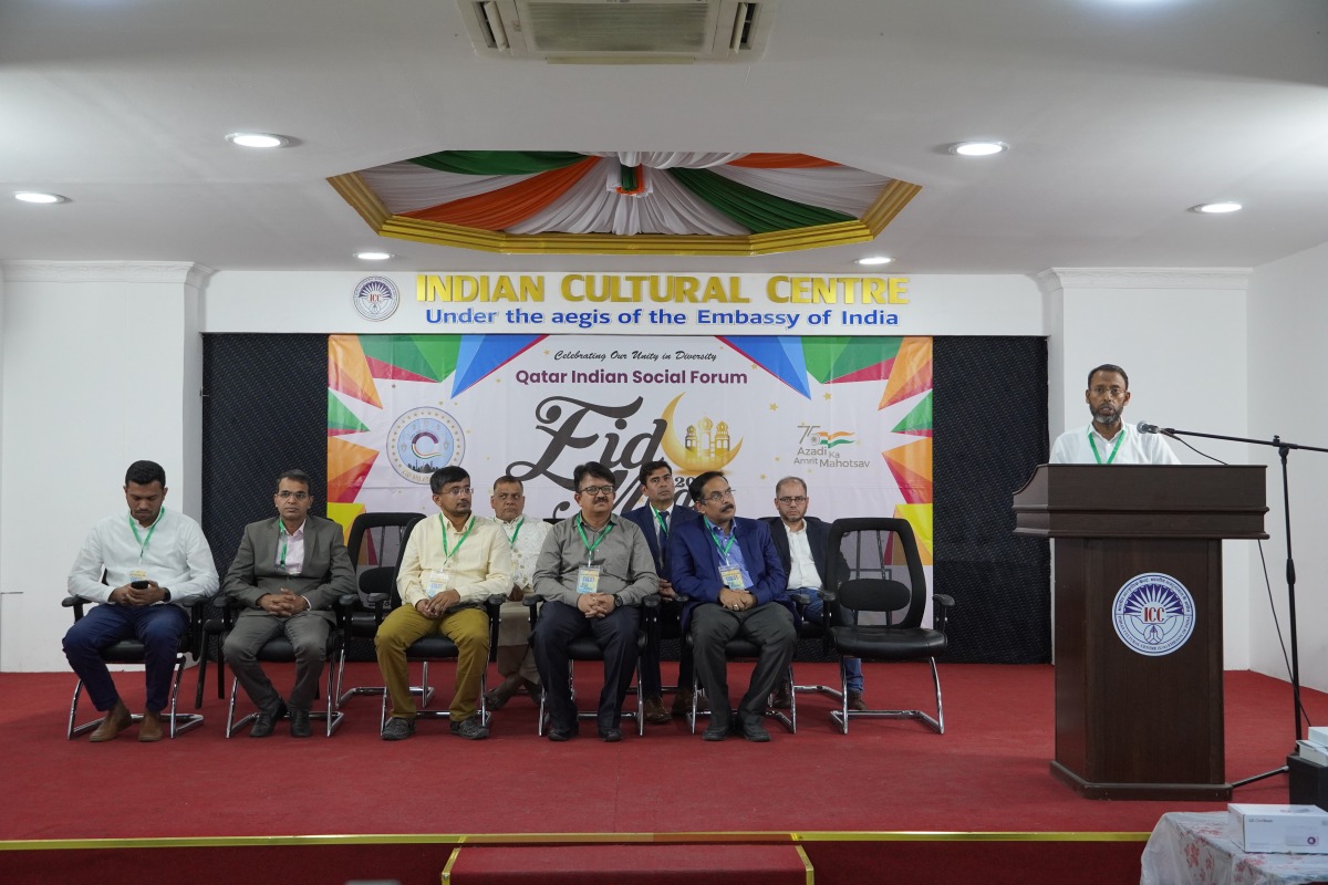 Qatar Indian Social Forum management members and guests attending the Eid celebration event. 