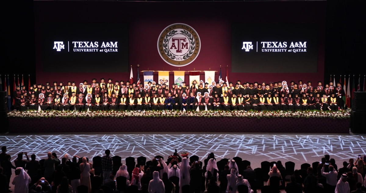 Minister of Education and Higher Education H E Buthaina bint Ali Al Nuaimi and other officials with graduates at the commencement.   
