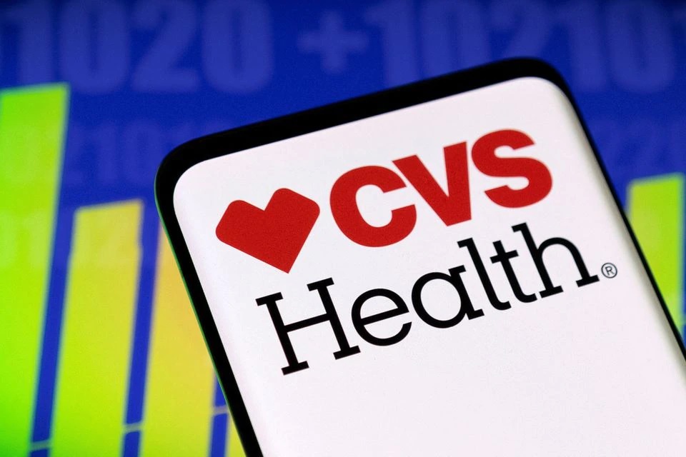 CVS Health logo and stock graph are seen displayed in this illustration taken, May 3, 2022. REUTERS/Dado Ruvic/Illustration

