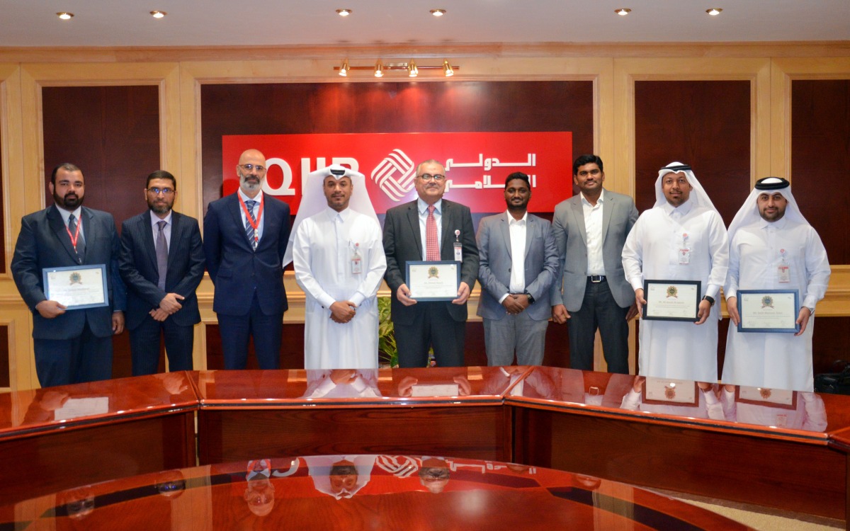 QIIB Chief of Human Resources and Administrative Affairs Ali Hamad Al Mesaifri and other officials during the event. 
