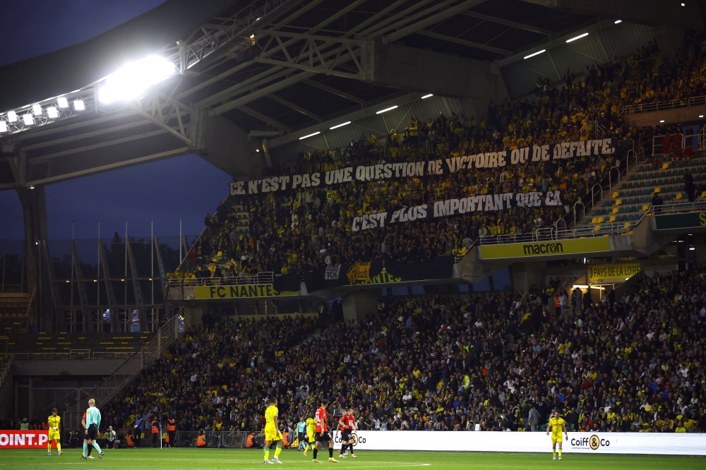 General view of players and Nantes fans Reuters/Stephane Mahe