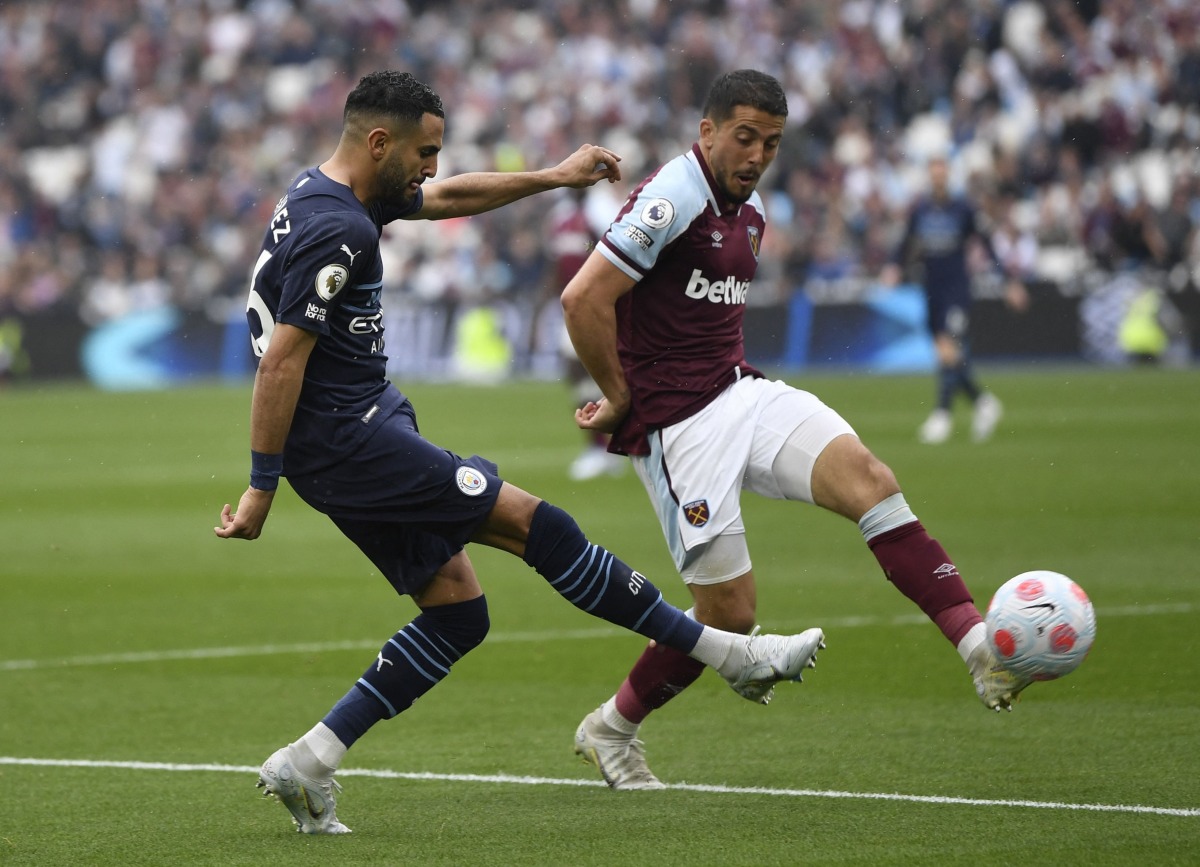 Manchester City's Riyad Mahrez in action with West Ham United's Pablo Fornals REUTERS/Tony Obrien