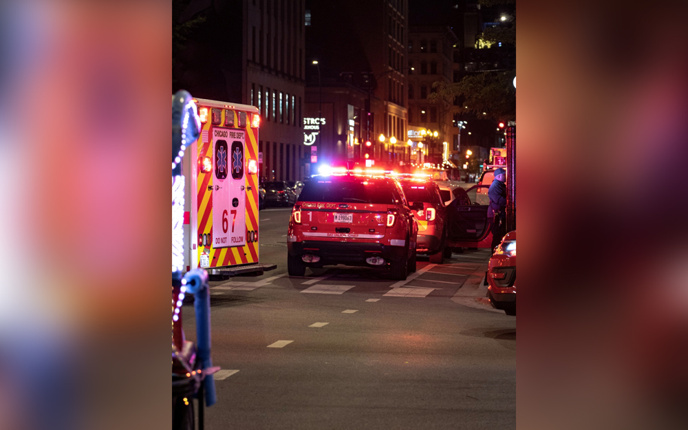 Chicago Fire Department (CFD) vehicles are seen on the street after gunfire erupted on Thursday night outside a McDonald's near the city's Magnificent Mile shopping section, in Chicago, Illinois, U.S. May 19, 2022 in this picture obtained from social media. Twitter/@DamianChlanda/via REUTERS 