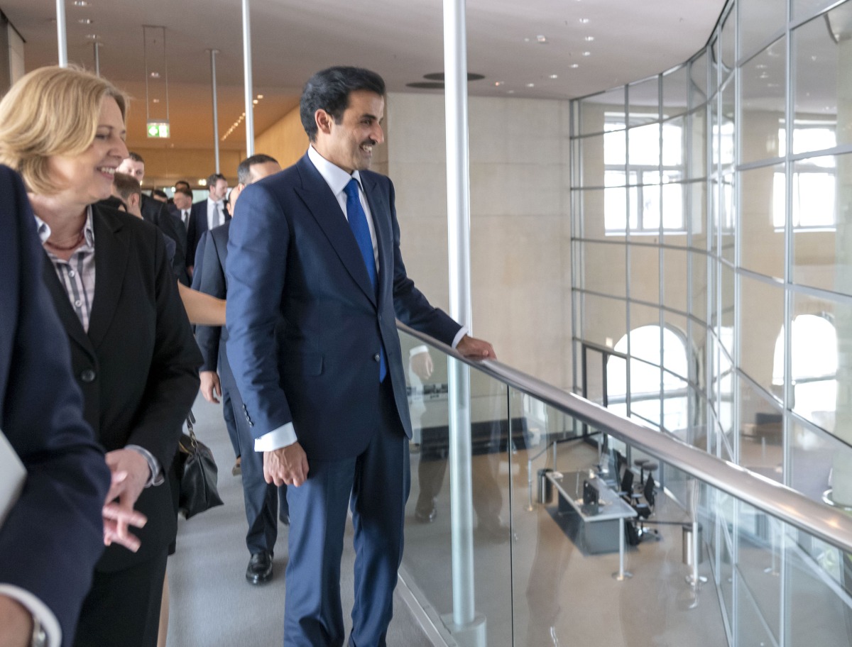 Amir H H Sheikh Tamim bin Hamad Al Thani during his visit to German Bundestag (Parliament). Also seen is Parliament President H E Baerbel Bas.