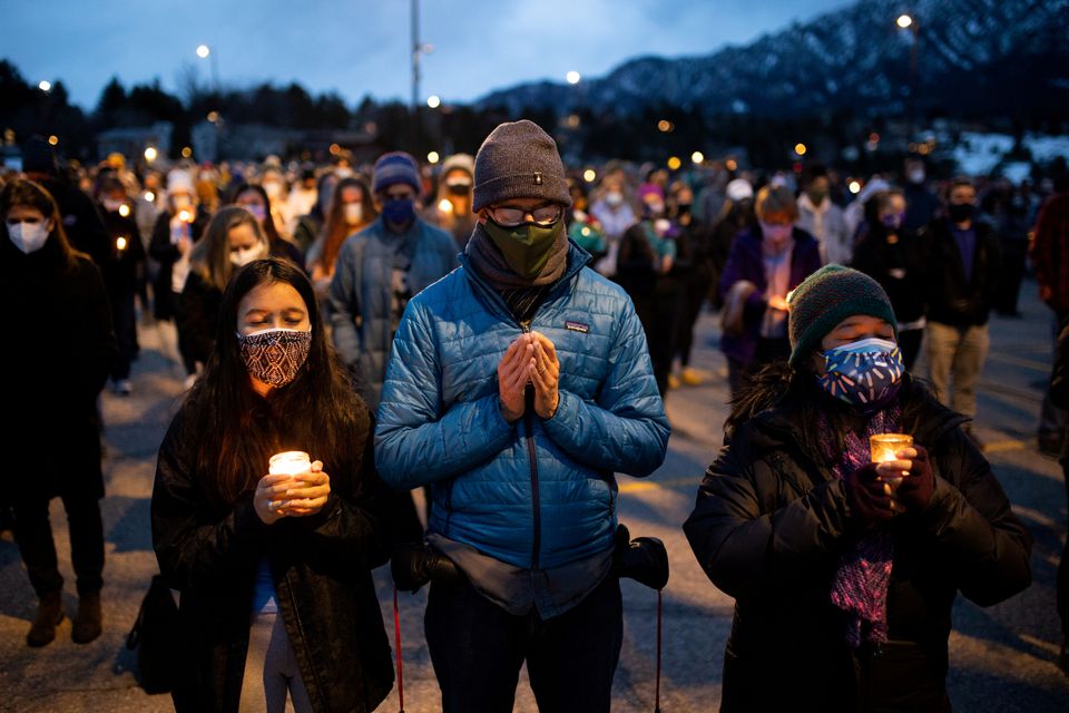 Hundreds gather at Fairview High School for a candlelight vigil to remember the victims of a mass shooting that left 10 dead at King Soopers grocery store in Boulder, Colorado, U.S. March 25, 2021. REUTERS/Alyson McClaran/File Photo

