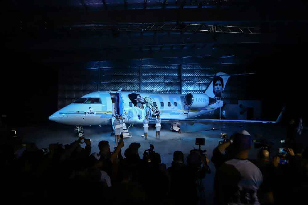 People take part in an event to launch the world tour to Qatar’s World Cup of the TANGO D10S in Buenos Aires, Argentina May 25, 2022. Reuters/Matias Baglietto