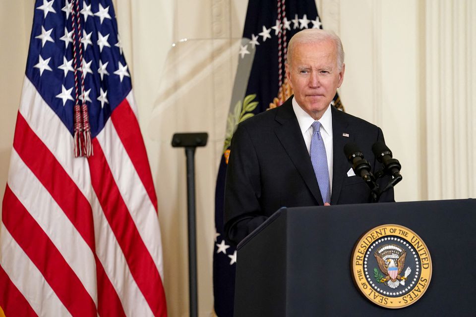U.S. President Joe Biden speaks ahead of the signing of an executive order to reform federal and local policing on the second anniversary of the death of George Floyd, during an event at the White House in Washington, U.S., May 25, 2022. REUTERS/Kevin Lamarque


