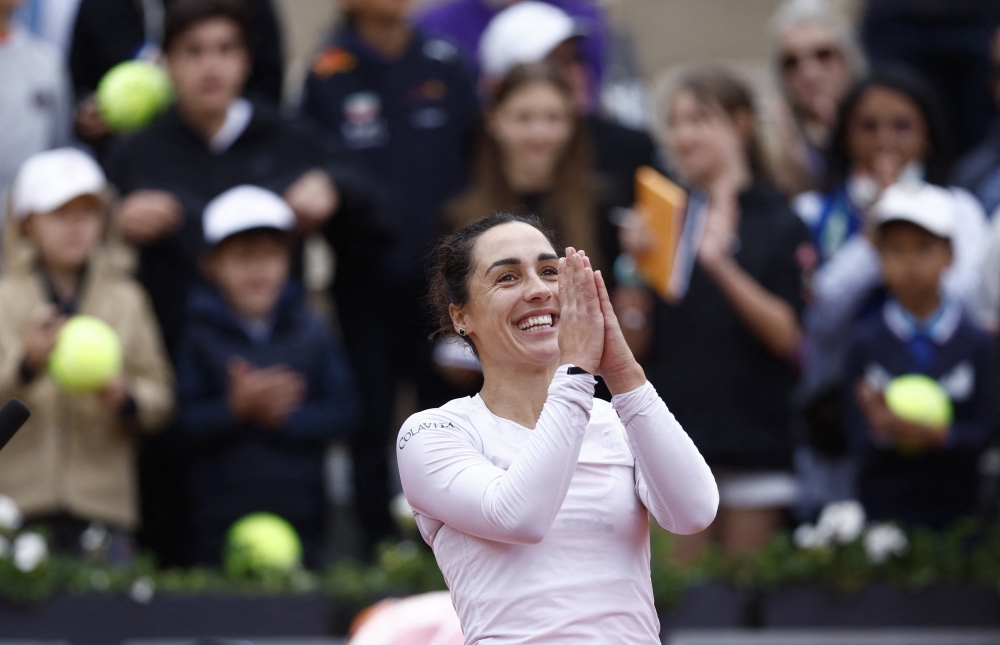 May 29, 2022 Italy's Martina Trevisan celebrates winning her fourth round match against Belarus' Aliaksandra Sasnovich REUTERS/Yves Herman