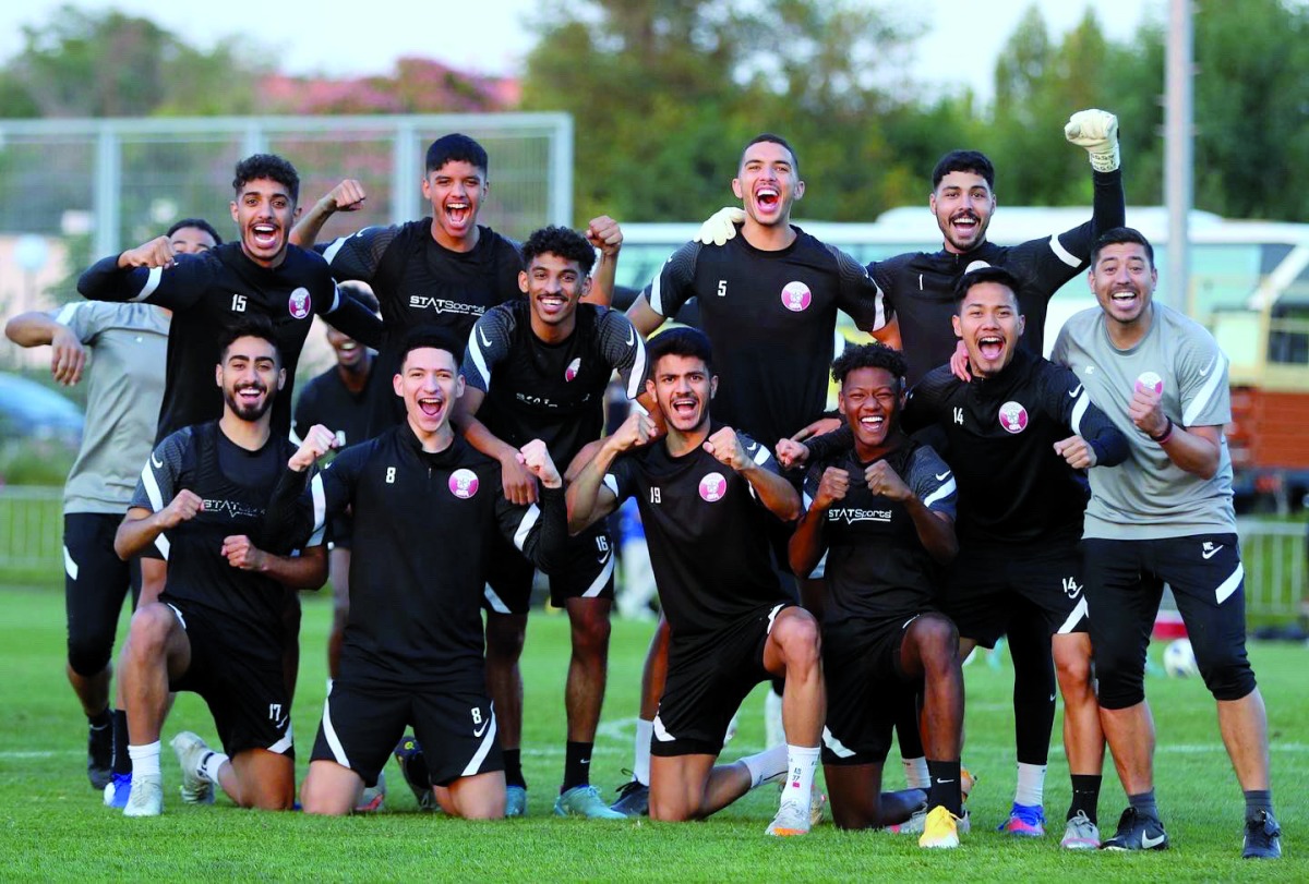 Head coach Nicolas Cordova with Qatar U-23 team players after a training session in Tashkent, Uzbekistan, yesterday.