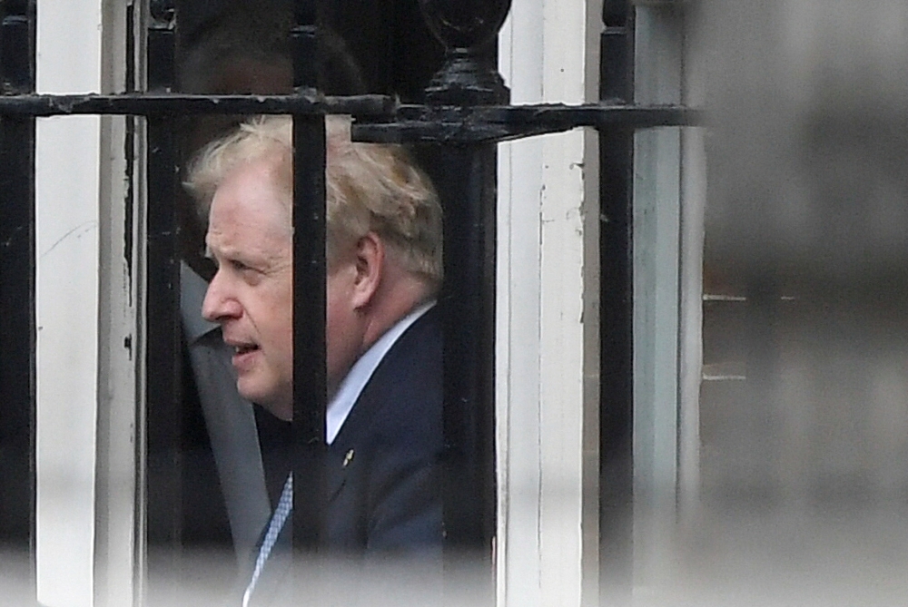 British Prime Minister Boris Johnson leaves from the back entrance of Downing Street in London, Britain June 6, 2022. Reuters/Toby Melville