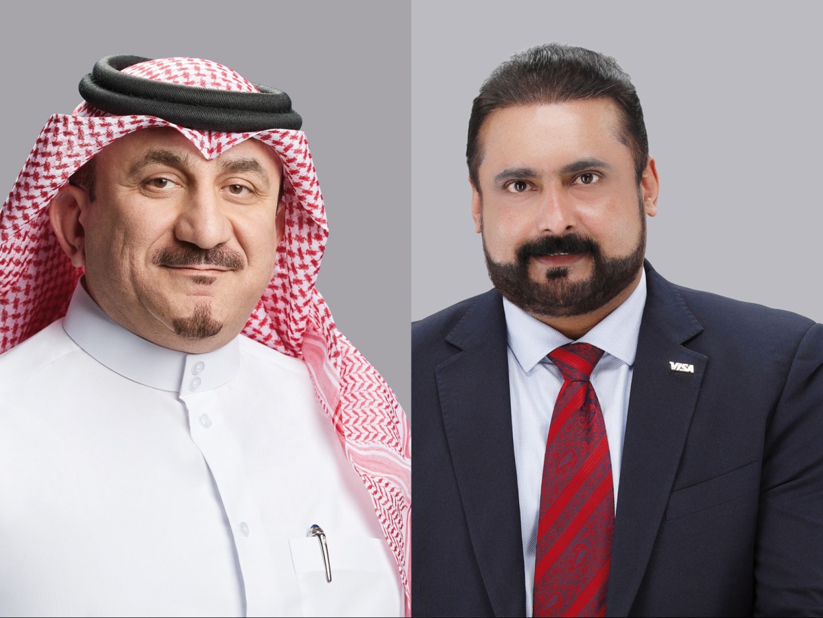 Deputy CEO - Business Support, Services and Human Resources at Ahlibank Mohamed Al Namla (left) and Visa’s Country Manager for Qatar Dr. Sudheer Nair