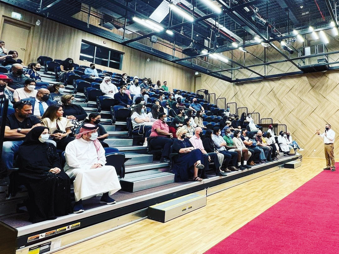 Participants listen to a speaker during the seminar.