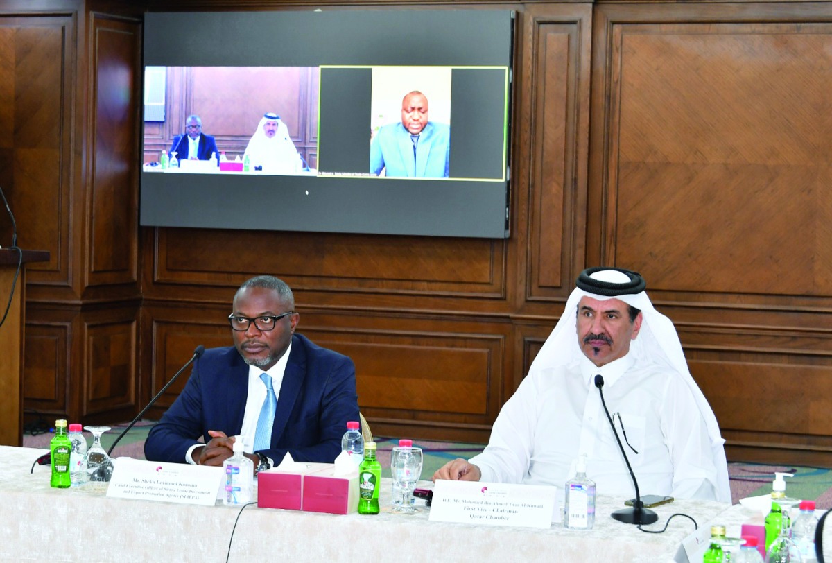 QC First Vice-Chairman Mohammad bin Towar Al Kuwari, and CEO of SLIEPA Sheku Lexmond Koroma, during the business meeting, yesterday. 