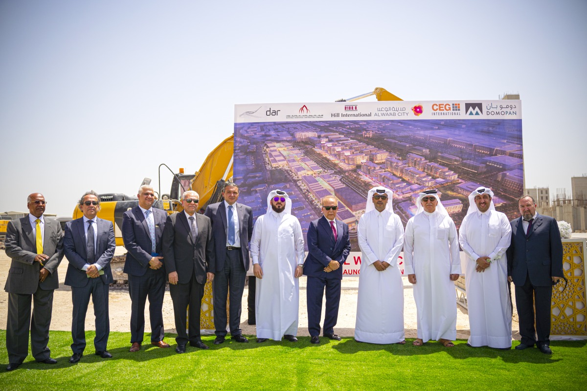 Sheikh Nawaf bin Nasser bin Khaled Al Thani (third right), Chairman of NBK, Abdulla bin Mubarak Al Khalifa (fourth right), Group CEO of QNB, Sheikh Jassim bin Nawaf bin Nasser Al Thani (centre), DCEO of Al Wa’ab City, and other officials, during the launch ceremony. 
