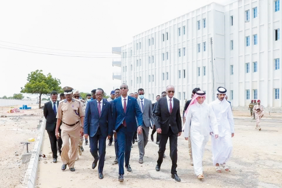 Prime Minister of Somalia H E Hamza Abdi Barre and other officials visiting the site of the Government Presidency Building project being funded by Qatar Fund for Development. 