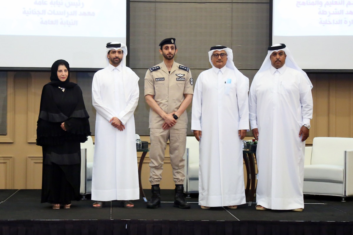 Minister of Justice H E Masoud bin Mohammed Al Ameri with other official during the panel discussion. 