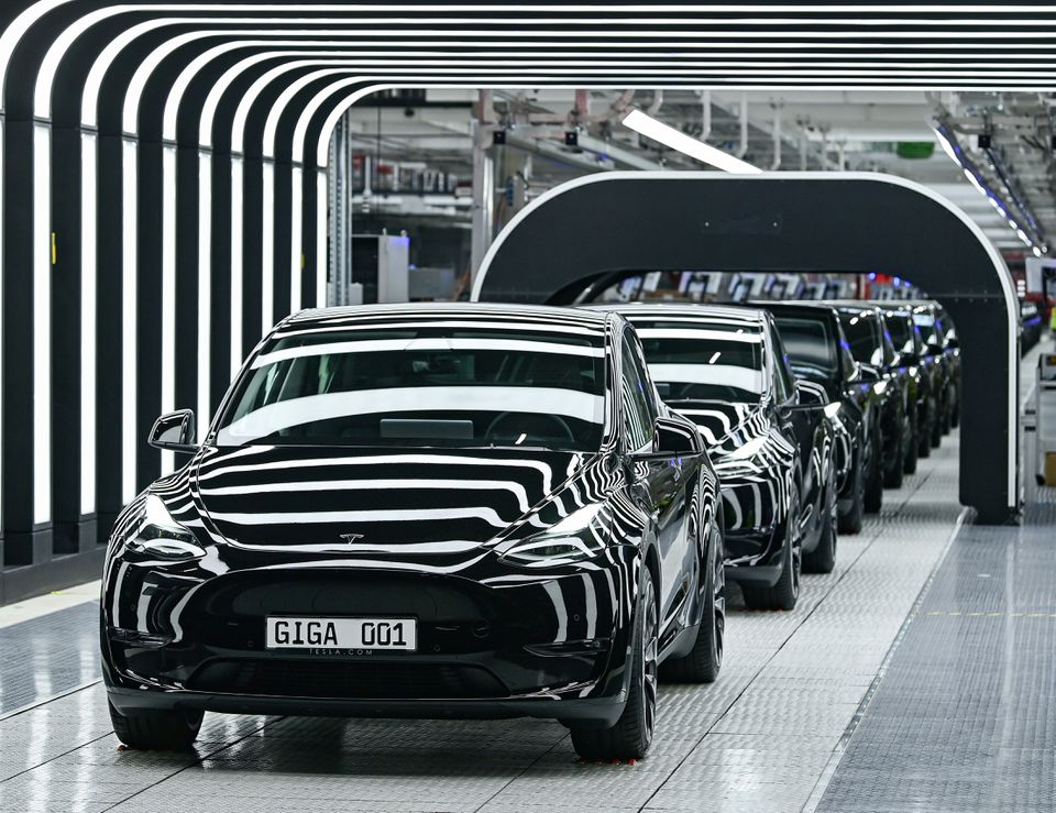 Model Y cars are pictured during the opening ceremony of the new Tesla Gigafactory for electric cars in Gruenheide, Germany, March 22, 2022. Patrick Pleul/Pool via REUTERS


