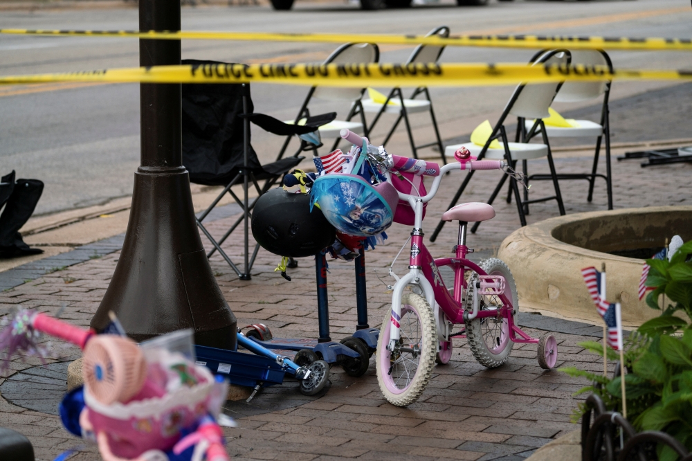 Children's bikes are left behind after a mass shooting at a Fourth of July parade route in the wealthy Chicago suburb of highland Park, Illinois, US, on July 4, 2022. (Reuters/Max Herman)