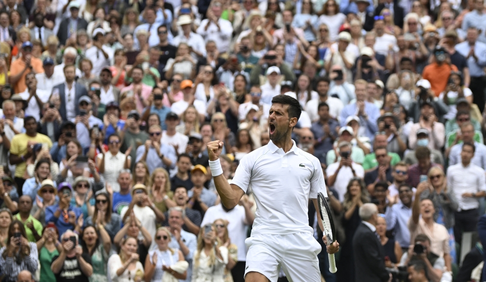Serbia's Novak Djokovic celebrates winning his quarter final match against Italy's Jannik Sinner REUTERS/Toby Melville
