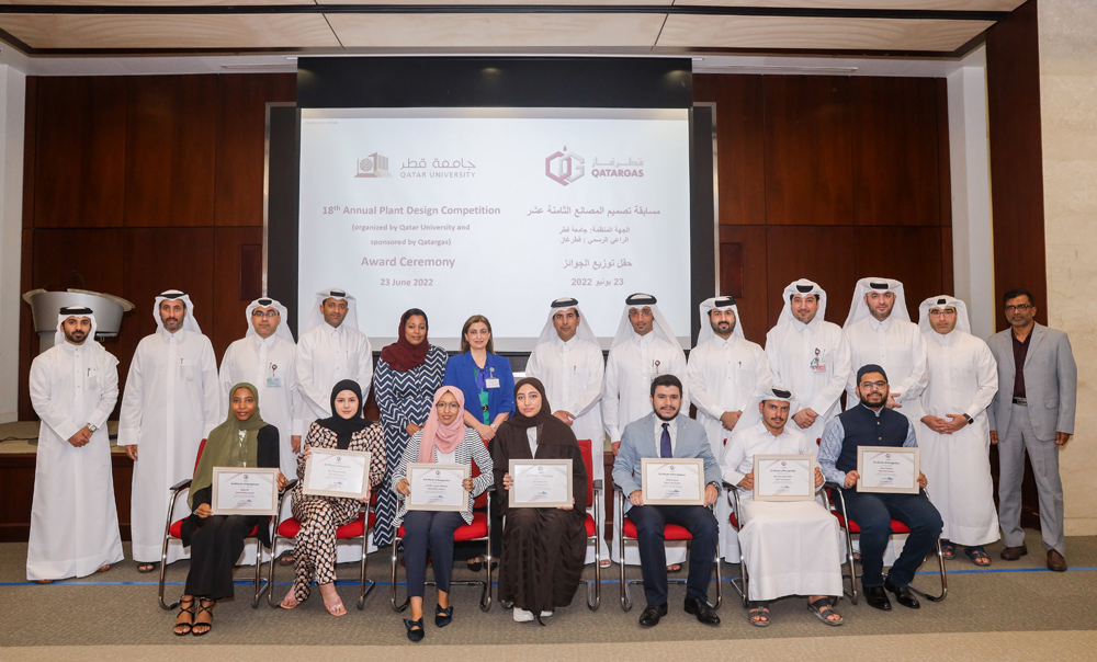 Qatargas and Qatar University officials with winners of the 18th Plant Design Competition at the award ceremony.