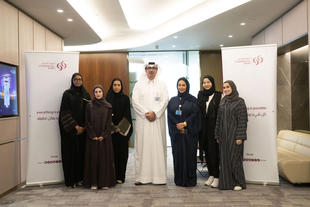 Qatar University students with officials during their visit to the Commercial Bank.