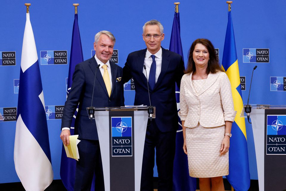 Sweden's Foreign Minister Ann Linde and Finland's Foreign Minister Pekka Haavisto attend a news conference with NATO Secretary General Jens Stoltenberg, after signing their countries' accession protocols at the alliance's headquarters in Brussels, Belgium July 5, 2022. REUTERS/Yves Herman/File Photo
