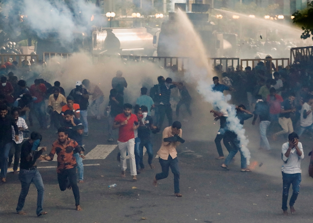 Police use tear gas and water cannons to disperse demonstrators near President's residence during a protest demanding the resignation of President Gotabaya Rajapaksa, amid the country's economic crisis, in Colombo, Sri Lanka, July 8, 2022. (Reuters/Dinuka Liyanawatte)