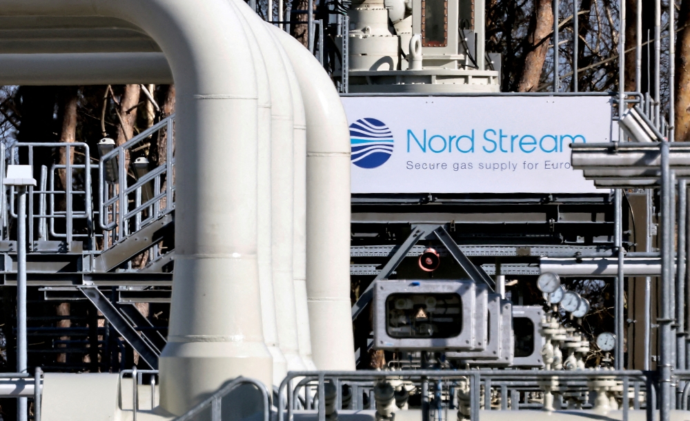 FILE PHOTO: Pipes at the landfall facilities of the 'Nord Stream 1' gas pipeline are pictured in Lubmin, Germany, March 8, 2022. REUTERS/Hannibal Hanschke