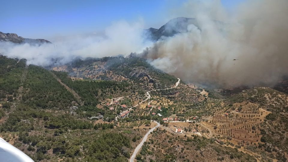 Smoke rises from a wildfire in Datca in Mugla province, Turkey July 13, 2022. Mugla Regional Forestry Directorate/Handout via REUTERS
