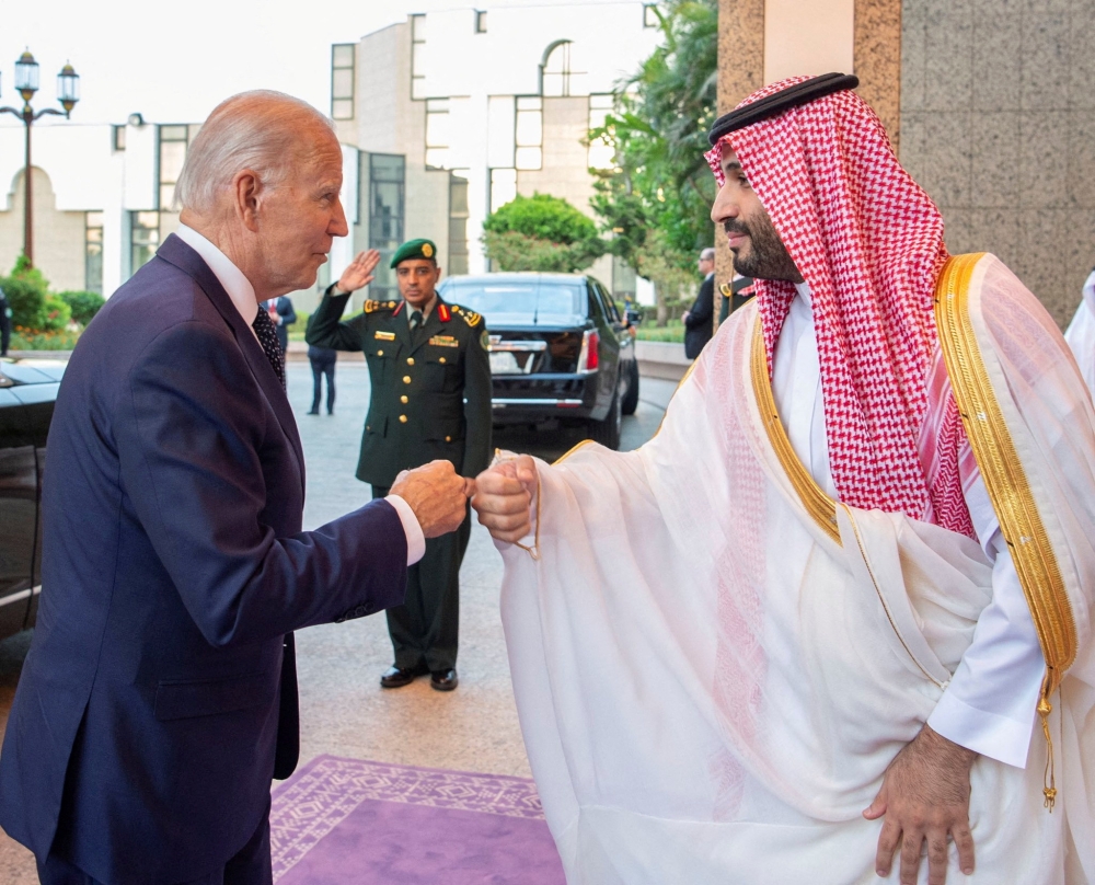 Saudi Crown Prince HRH Mohammed bin Salman fist bumps US President Joe Biden upon his arrival at Al Salman Palace, in Jeddah, Saudi Arabia, on July 15, 2022. (Photo: Bandar Algaloud/Courtesy of Saudi Royal Court via Reuters)