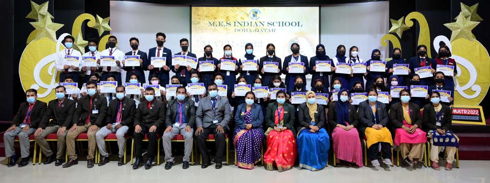 Students pose with their certificates after the musical and acting talents ride competition.