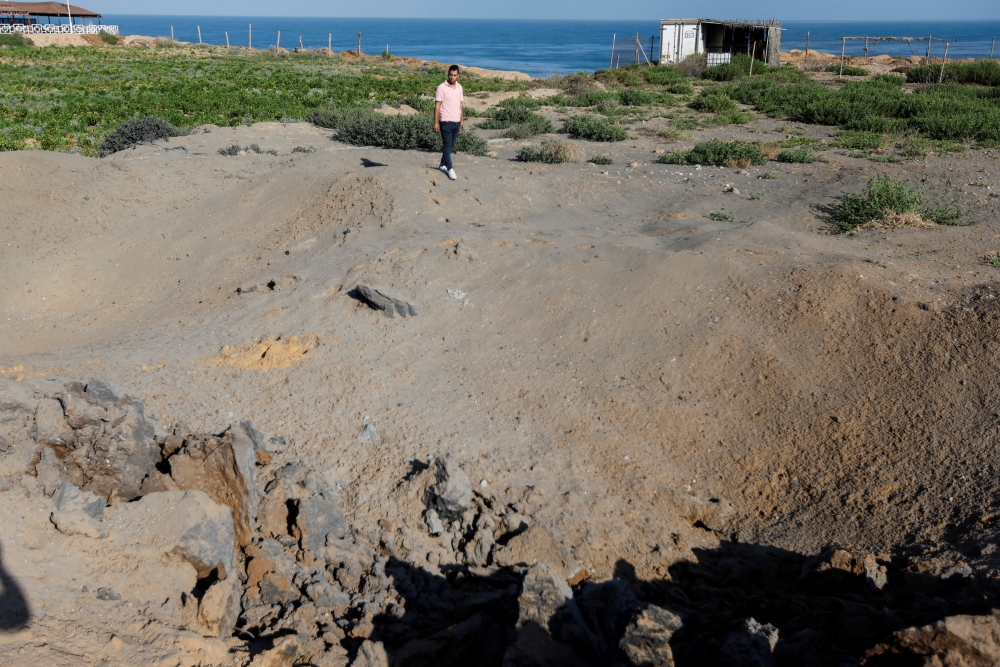 A view shows the site of an Israeli air strike carried out in Gaza City July 16, 2022. REUTERS/Ibraheem Abu Mustafa