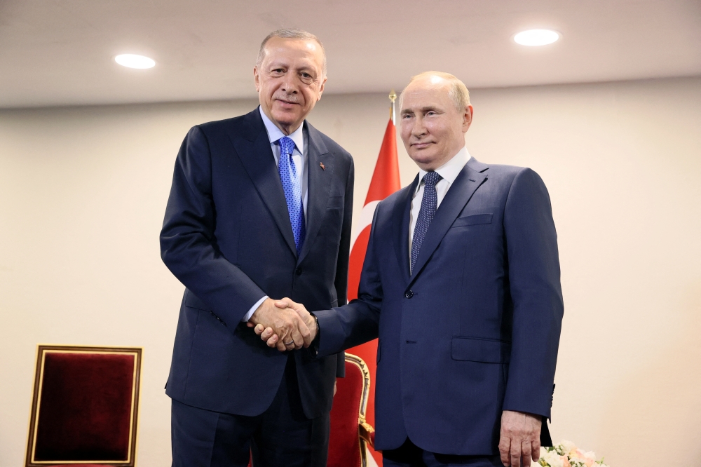 Russian President Vladimir Putin with Turkish President Tayyip Erdogan during a meeting in Tehran, Iran, July 19, 2022. (Reuters)