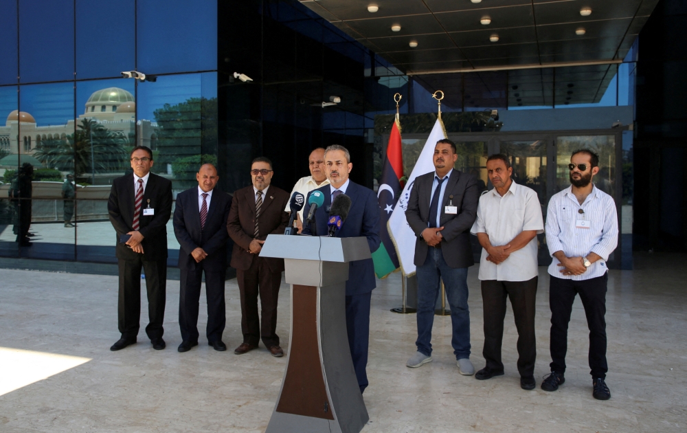 Farhat Bengdara, newly appointed as chairman of the Libyan state National Oil Corporation (NOC), speaks during a news conference in Tripoli, Libya, July 14, 2022. (REUTERS/Hazem Ahmed)