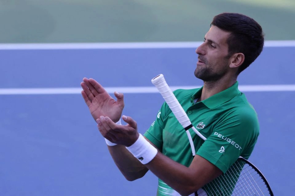 Serbian tennis player Novak Djokovic performs during the opening of a regional tennis centre that will prepare top tennis players for major tournaments, in Visoko, Bosnia and Herzegovina July 13, 2022. REUTERS/Dado Ruvic


