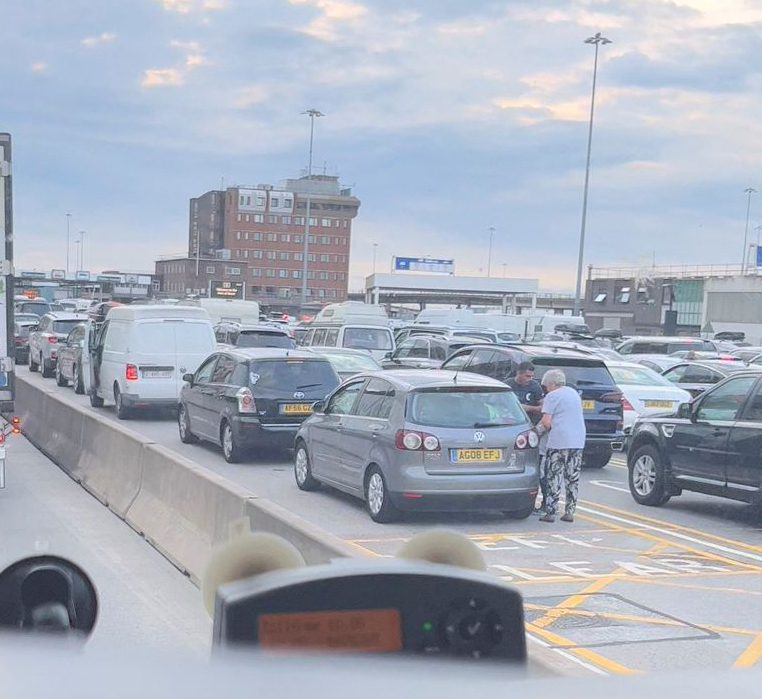A view shows long queues of vehicles during a traffic in Dover, Britain July 22, 2022 in this still image obtained from a social media video. Twitter/ @scaniatruck620/via REUTERS

