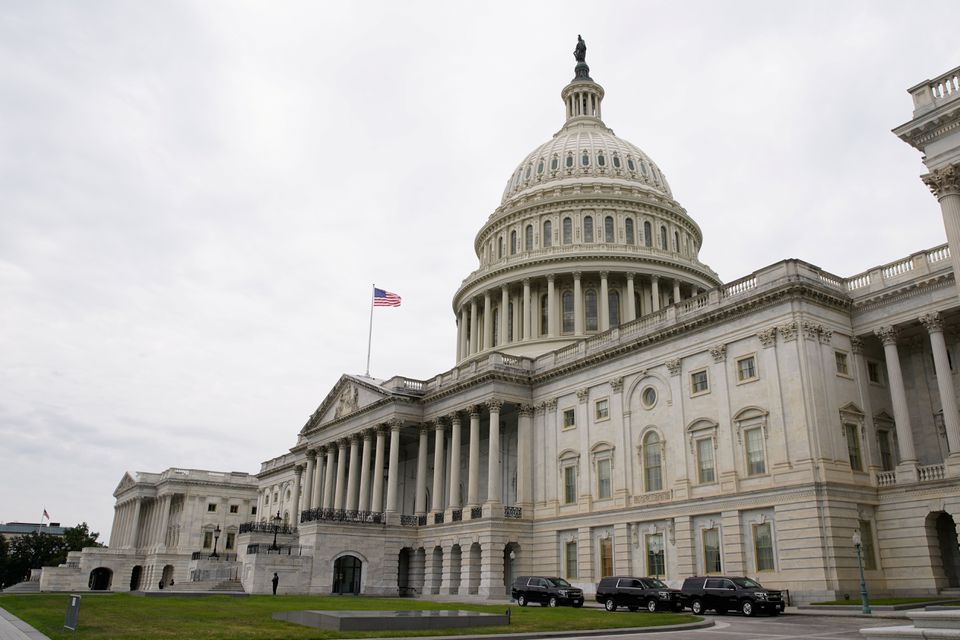 Vehicles are parked outside the U.S. Capitol building the morning the Senate returned to session in Washington, DC, U.S., July 31, 2021. REUTERS/Elizabeth Frantz

