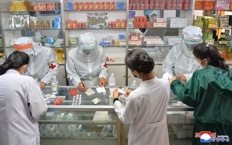 Army medics involved medicine supply distribution work amid the COVID-19 pandemic in Pyongyang, North Korea May 22, 2022 in this photo released May 23, 2022 by the country's Korean Central News Agency. KCNA via REUTERS

