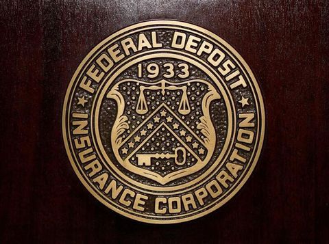 The Federal Deposit Insurance Corp (FDIC) logo is seen at the FDIC headquarters in Washington, February 23, 2011. REUTERS/Jason Reed