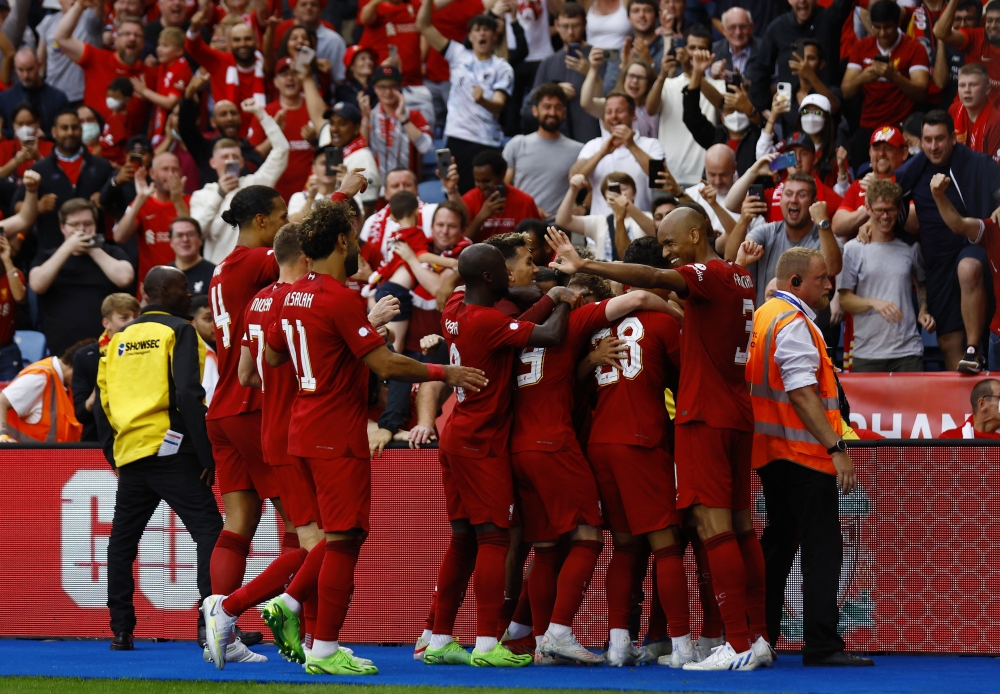 Liverpool's Darwin Nunez celebrates scoring their third goal with teammates (Reuters/Andrew Boyers)