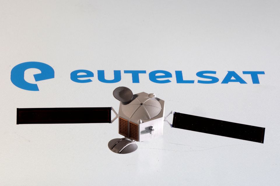 A satellite model is placed on Eutelsat logo in this picture illustration taken April 4, 2022. REUTERS/Dado Ruvic/Illustration/

