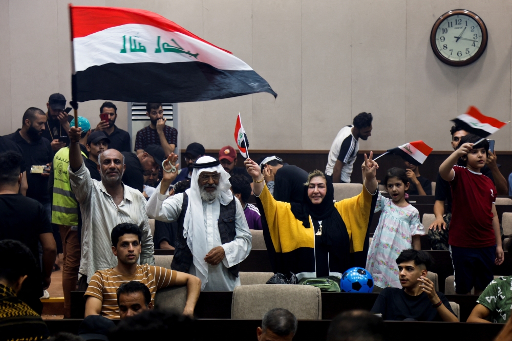 Supporters of Iraqi populist leader Moqtada al-Sadr gather during a sit-in at the parliament building, amid political crises in Baghdad, Iraq, July 31, 2022. (REUTERS/Khalid Al-Mousily)