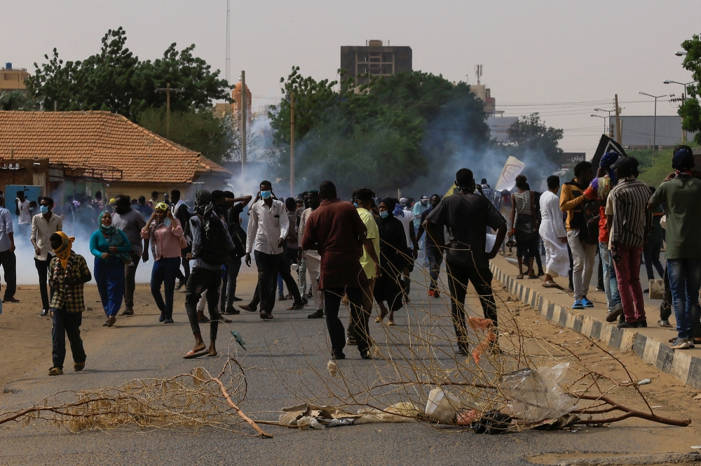 Protesters march during a rally against military rule following the last coup, in Khartoum, Sudan, July 31, 2022. (REUTERS/Mohamed Nureldin Abdallah)