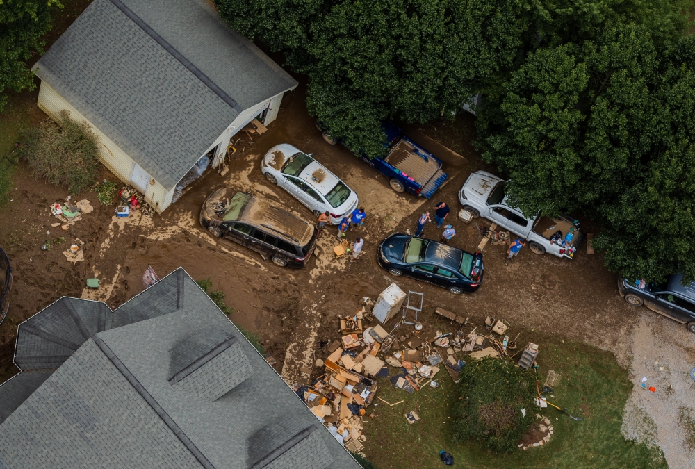 A Kentucky Army National Guard helicopter crew surveys disaster areas due to flooding during a media flight around eastern Kentucky, US, July 30, 2022. (Reuters)