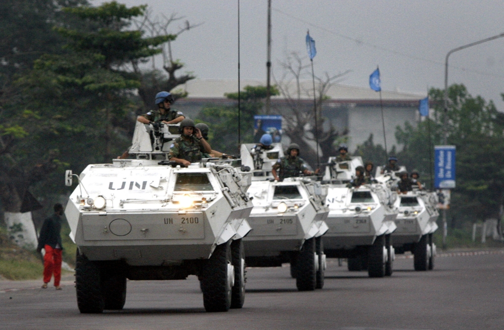 File Photo: United Nations peacekeeping troops patrol the streets in armoured personnel carriers on election day in Democratic Republic of Congo's capital Kinshasa on July 30, 2006. (REUTERS/Finbarr O'Reilly)