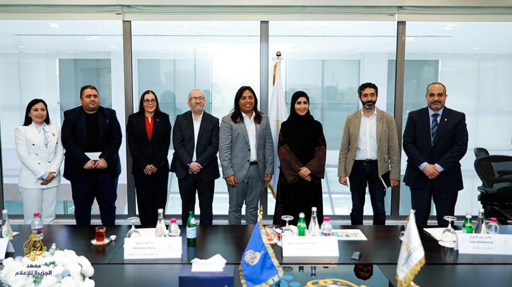 Delegates from the Venezuelan embassy in Doha with a delegation from RedRadiove during a visit to the Al Jazeera Media Institute.