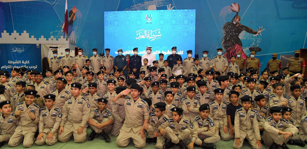 Undersecretary of the Ministry of Interior and the Commander of the Lekhwiya Force H E Major General Abdulaziz bin Faisal Al Thani and officers with the students of the new batch.